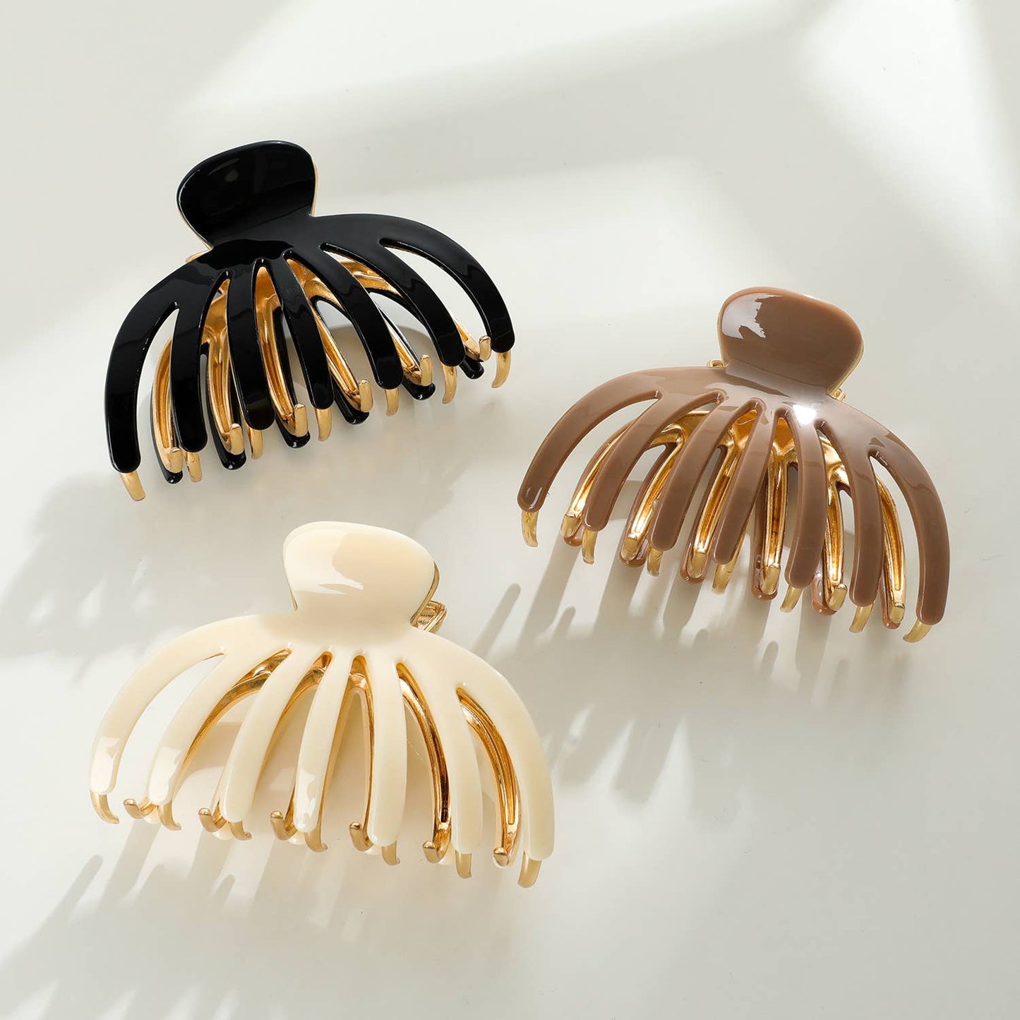 
                  
                    Hailey Solid Gold Metal Octopus Claw Clip - Large: Assorted
                  
                