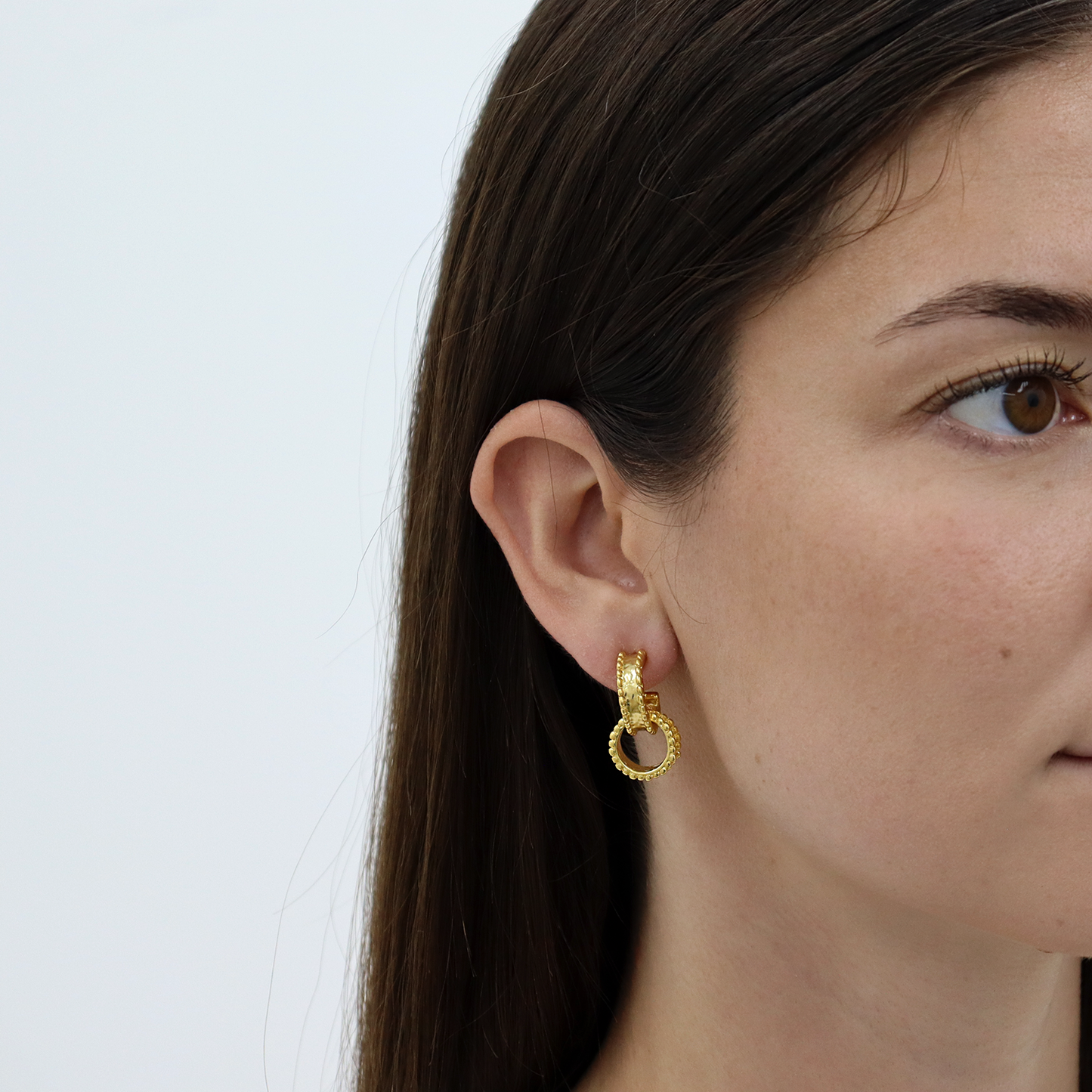 
                  
                    Dotty Intertwined Hoops - 24K Gold Plated
                  
                