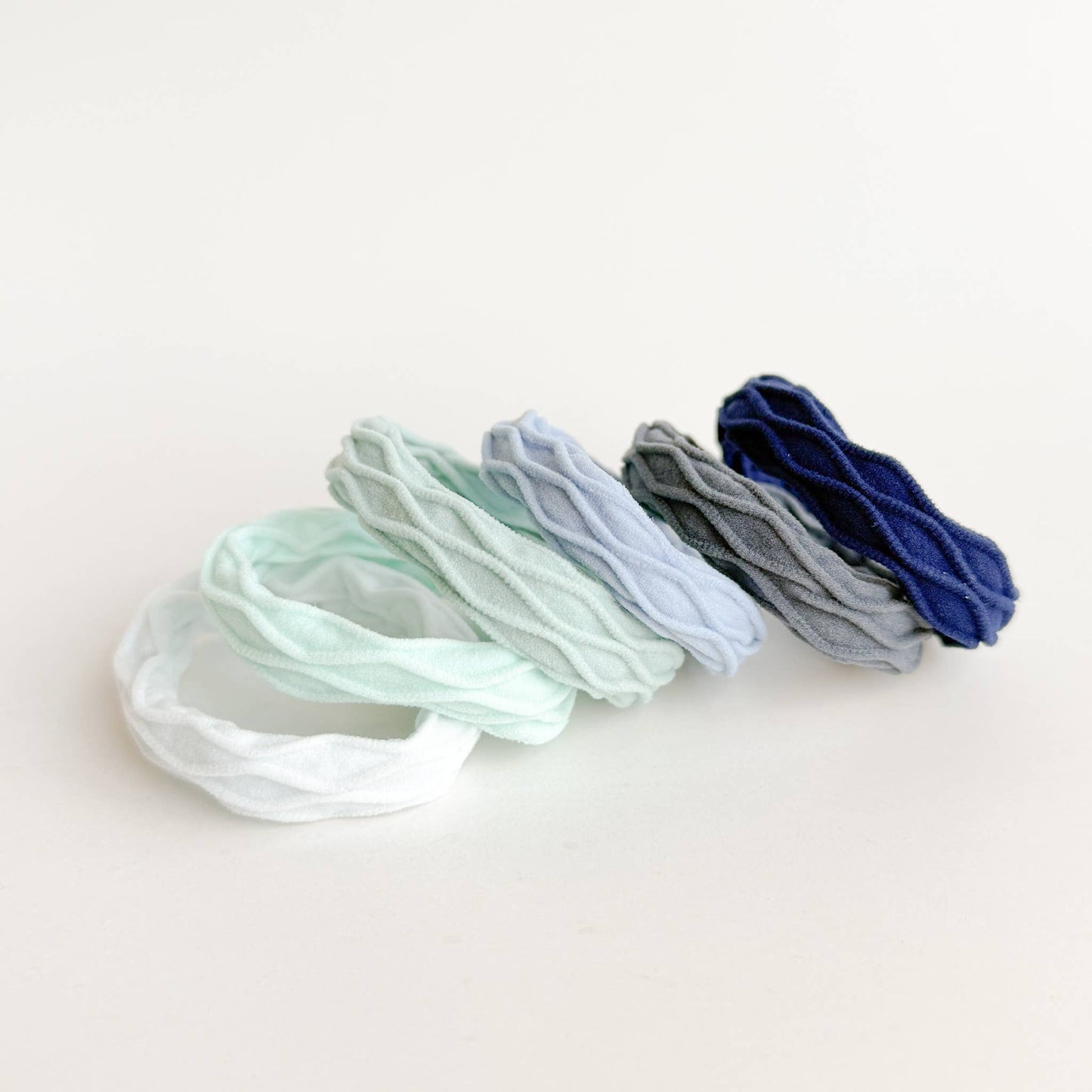 
                  
                    Coastal Wavy Seamless Hair Ties (Set of 6)
                  
                