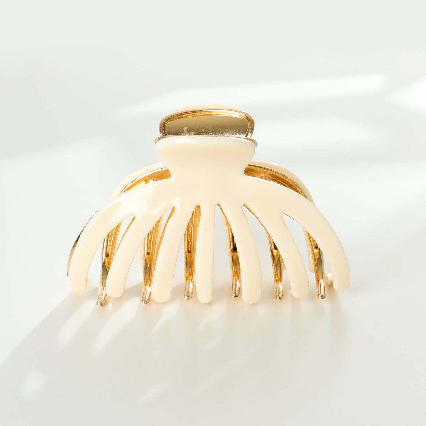 
                  
                    Hailey Solid Gold Metal Octopus Claw Clip - Large: Assorted
                  
                
