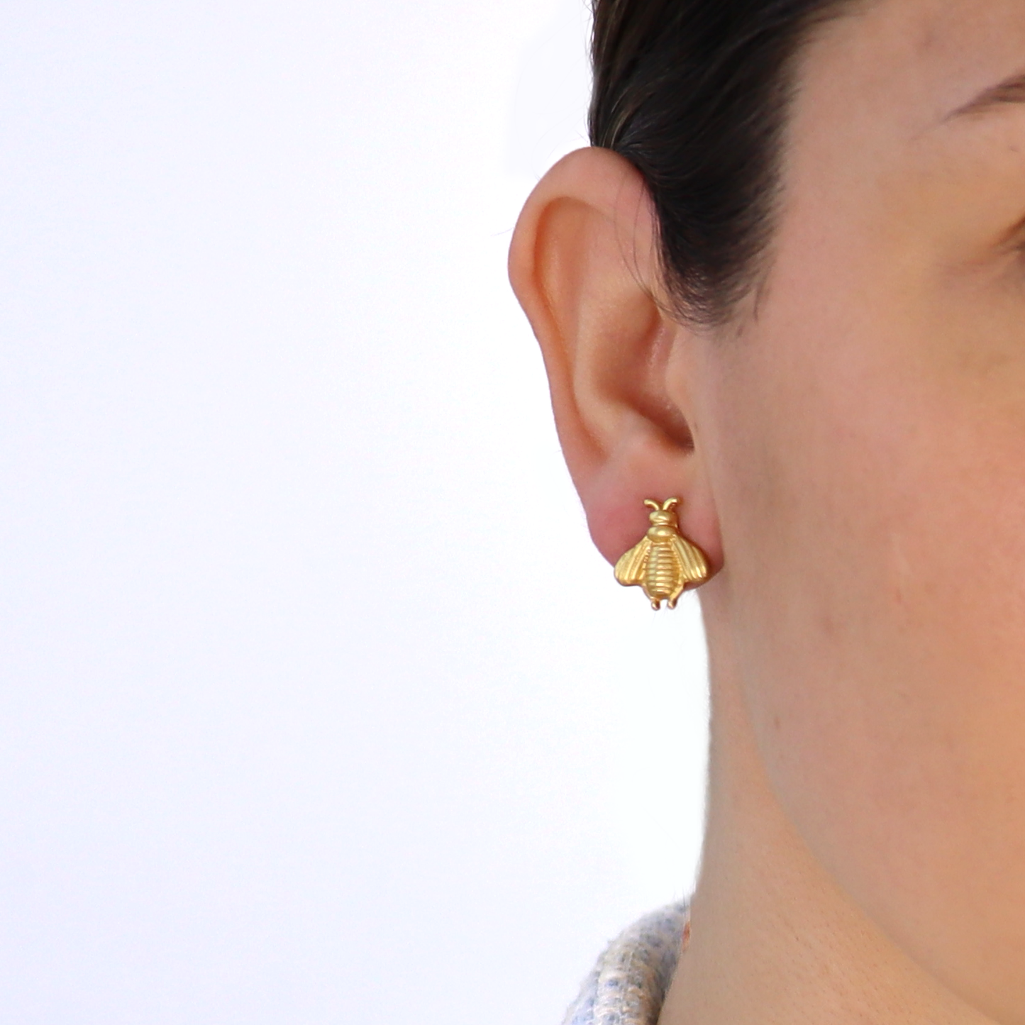 
                  
                    Delicate Bee Stud Earrings - 24K Gold Plated: Gold
                  
                
